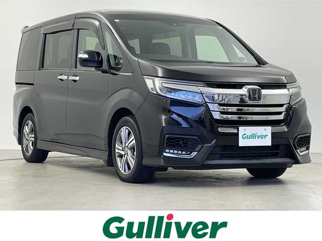 ホンダ ステップワゴン スパーダ eHEV G EXホンダS 岐阜県 2021(令3)年 5.9万km プレミアムスパークルブラックパール 純正10インチメモリナビ/　(AM/FM/CD/DVD/フルセグTV/Bluetooth)/バックカメラ/ホンダセンシング/衝突軽減ブレーキ/レーンキープアシスト/誤発進抑制機能/レーダークルーズコントロール/両側パワースライドドア/ハーフレザーシート/シートヒーター/革巻きハンドル/ビルトインETC2.0/純正ドライブレコーダー/LEDヘッドライト/電動パーキングブレーキ/純正アルミホイール/純正フロアマット/ドアバイザー