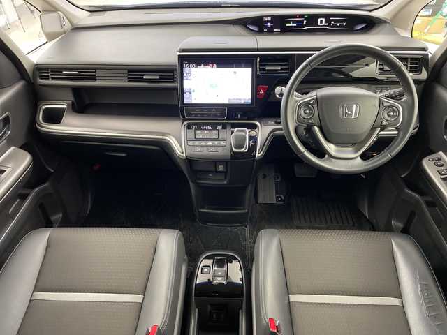 ホンダ ステップワゴン スパーダ eHEV G EXホンダS 岐阜県 2021(令3)年 5.9万km プレミアムスパークルブラックパール 純正10インチメモリナビ/　(AM/FM/CD/DVD/フルセグTV/Bluetooth)/バックカメラ/ホンダセンシング/衝突軽減ブレーキ/レーンキープアシスト/誤発進抑制機能/レーダークルーズコントロール/両側パワースライドドア/ハーフレザーシート/シートヒーター/革巻きハンドル/ビルトインETC2.0/純正ドライブレコーダー/LEDヘッドライト/電動パーキングブレーキ/純正アルミホイール/純正フロアマット/ドアバイザー