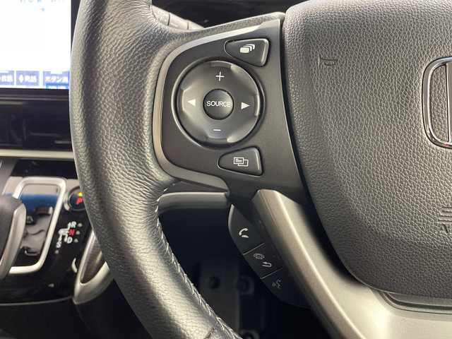 ホンダ ステップワゴン スパーダ eHEV G EXホンダS 岐阜県 2021(令3)年 5.9万km プレミアムスパークルブラックパール 純正10インチメモリナビ/　(AM/FM/CD/DVD/フルセグTV/Bluetooth)/バックカメラ/ホンダセンシング/衝突軽減ブレーキ/レーンキープアシスト/誤発進抑制機能/レーダークルーズコントロール/両側パワースライドドア/ハーフレザーシート/シートヒーター/革巻きハンドル/ビルトインETC2.0/純正ドライブレコーダー/LEDヘッドライト/電動パーキングブレーキ/純正アルミホイール/純正フロアマット/ドアバイザー