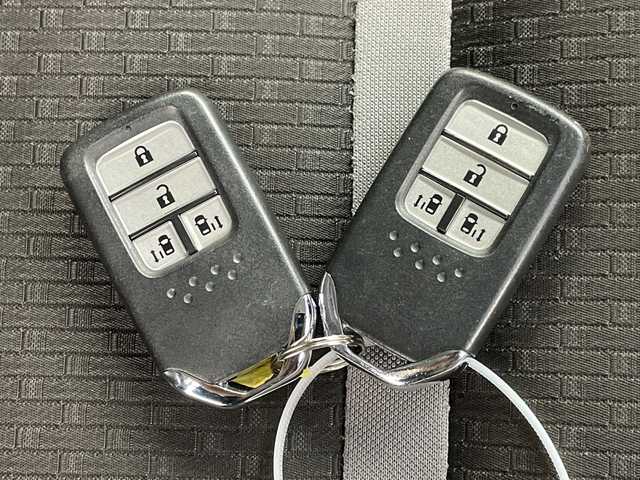 ホンダ ステップワゴン スパーダ eHEV G EXホンダS 岐阜県 2021(令3)年 5.9万km プレミアムスパークルブラックパール 純正10インチメモリナビ/　(AM/FM/CD/DVD/フルセグTV/Bluetooth)/バックカメラ/ホンダセンシング/衝突軽減ブレーキ/レーンキープアシスト/誤発進抑制機能/レーダークルーズコントロール/両側パワースライドドア/ハーフレザーシート/シートヒーター/革巻きハンドル/ビルトインETC2.0/純正ドライブレコーダー/LEDヘッドライト/電動パーキングブレーキ/純正アルミホイール/純正フロアマット/ドアバイザー