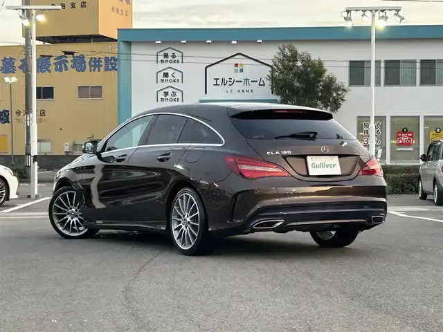 メルセデス・ベンツ ＣＬＡ１８０ Sブレイク AMG スタイル 愛媛県 2018(平30)年 6.7万km 茶 メーカーオプション純正ナビ/BT/AM・FM/CD/DVD/フルセグTV/ETC/前後ドライブレコーダー/ブラインドスポットモニター/前後コーナーセンサー/バックカメラ/レーンキープアシスト/衝突軽減システム/パーキングアシスト/アイドリングストップ/パドルシフト/追従型クルーズコントロール/harman kardonスピーカー/ガラスルーフ/D+N席シートヒーター・パワーシート/純正フロアマット/純正アルミホイール