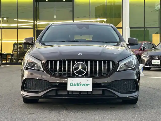 メルセデス・ベンツ ＣＬＡ１８０ Sブレイク AMG スタイル 愛媛県 2018(平30)年 6.7万km 茶 メーカーオプション純正ナビ/BT/AM・FM/CD/DVD/フルセグTV/ETC/前後ドライブレコーダー/ブラインドスポットモニター/前後コーナーセンサー/バックカメラ/レーンキープアシスト/衝突軽減システム/パーキングアシスト/アイドリングストップ/パドルシフト/追従型クルーズコントロール/harman kardonスピーカー/ガラスルーフ/D+N席シートヒーター・パワーシート/純正フロアマット/純正アルミホイール