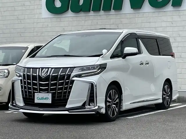トヨタ アルファード S Cパッケージ 宮崎県 2018(平30)年 7.7万km ホワイトパールクリスタルシャイン アルパイン11インチナビ/（CD/DVD/AM/FM/BT)/フルセグTV/バックカメラ/アルパイン12.8型フリップダウンモニタ/両側パワースライドドア/パワーバックドア/モデリスタフルエアロ/サンルーフ/D席/N席/2列目パワーシート/D席/N席シートシーター/D席/N席シートクーラー/ステアリングヒーター/レーダークルーズコントロール/ビルトインETC