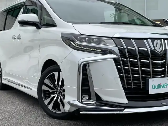 トヨタ アルファード S Cパッケージ 宮崎県 2018(平30)年 7.7万km ホワイトパールクリスタルシャイン アルパイン11インチナビ/（CD/DVD/AM/FM/BT)/フルセグTV/バックカメラ/アルパイン12.8型フリップダウンモニタ/両側パワースライドドア/パワーバックドア/モデリスタフルエアロ/サンルーフ/D席/N席/2列目パワーシート/D席/N席シートシーター/D席/N席シートクーラー/ステアリングヒーター/レーダークルーズコントロール/ビルトインETC