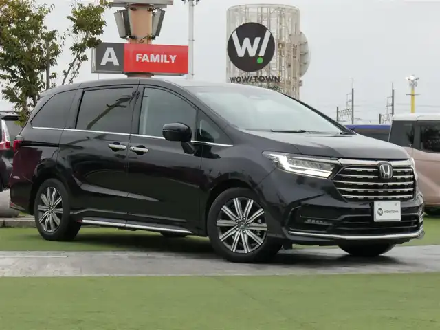ホンダ オデッセイ ハイブリッド e:HEVアブソルート 千葉県 2024(令6)年 0.1万km プレミアムヴィーナスブラックP 純正11.4インチナビ/・フルセグTV/CD/DVD/SD/USB/HDMI/Bluetooth/マルチビューカメラ/ビルトインETC/両側パワースライドドア/電子パーキングブレーキ/BREAK　HOLD機能/ハーフレザーシート/全席パワーシート/シートヒーター/電動オットマン/革巻きステアリング/ステアリングリモコン/純正17インチアルミホイール/純正LEDヘッドライト/純正LEDフォグライト/純正フロアマット/新車保証書/取扱説明書/スペアキー１本/ホンダセンシング/・アダプティブクルーズコントロール/・衝突軽減ブレーキシステム/・路外逸脱抑制システム/・先行車発進お知らせ機能/・ブラインドスポットモニター/・標識認識機能