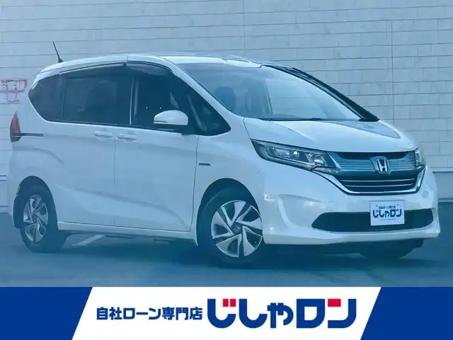ホンダ フリード ハイブリット G センシング 岡山県 2017(平29)年 11.3万km ホワイトオーキッドパール (株)IDOMが運営する【じしゃロン岡山店】の自社ローン専用車両です。こちらは現金またはオートローンご利用時の価格です。 自社ローンご希望の方は別途その旨お申し付け下さい/・純正ナビゲーション/・バックカメラ/・両側電動スライドドア/・センシング/・ＬＥＤライト