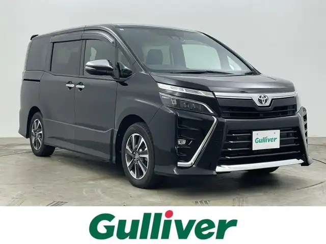 トヨタ ヴォクシー ZS 煌Ⅱ 岡山県 2020(令2)年 4.3万km ブラック アルパイン９インチナビ/【Bluetooth/フルセグTV/USB/HDMI】/衝突軽減ブレーキシステム/オートハイビーム/ＬＥＤヘッドライト/両側パワースライドドア/クルーズコントロール/バックカメラ/ビルトインＥＴＣ/社外ドライブレコーダー（前後）/コーナーセンサー（前後）/レーンアシスト/純正フロアマット/踏み間違い防止/ISOFIX/後席サンシェイド/ステアリングスイッチ/チルトステアリング/シートリフター/シートバックテーブル/ウインカーミラー/ドアバイザー/新車保証書/取扱説明書