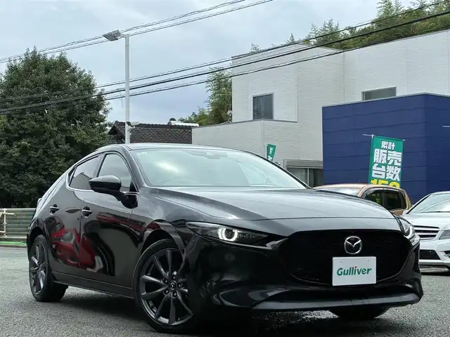 マツダ マツダ３ファストバック XD Lパッケージ 熊本県 2019(令1)年 8万km ジェットブラックマイカ BOSEサウンド/純正ナビ/【CD/DVD/SD/BT/HDMI】/全方位カメラ/i-ACTIVSENSE/スマートブレーキサポート/車線逸脱警報/ブラインドスポットモニター/コーナーセンサー/黒革シート/シートヒーター/パワーシート/ステアリングヒーター/ステアリングリモコン/純正18インチAW/ビルトインETC/オートLEDヘッドライト/電子パーキング/スマートキー/プッシュスタート