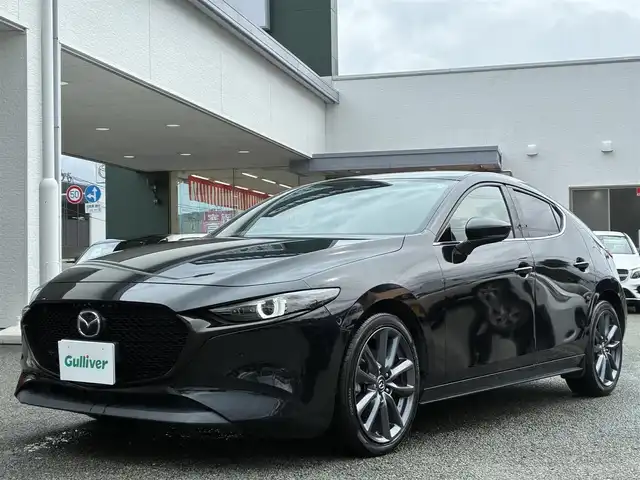 マツダ マツダ３ファストバック XD Lパッケージ 熊本県 2019(令1)年 8万km ジェットブラックマイカ BOSEサウンド/純正ナビ/【CD/DVD/SD/BT/HDMI】/全方位カメラ/i-ACTIVSENSE/スマートブレーキサポート/車線逸脱警報/ブラインドスポットモニター/コーナーセンサー/黒革シート/シートヒーター/パワーシート/ステアリングヒーター/ステアリングリモコン/純正18インチAW/ビルトインETC/オートLEDヘッドライト/電子パーキング/スマートキー/プッシュスタート