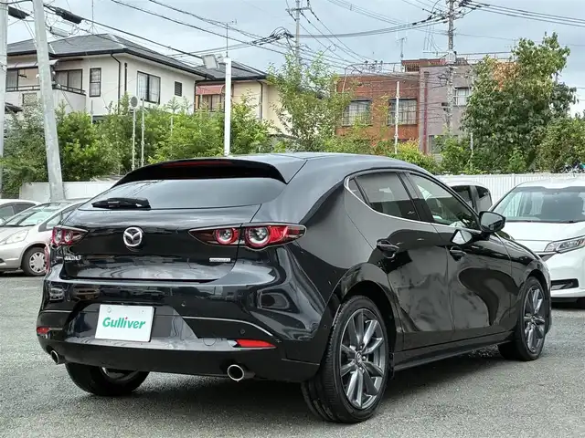 マツダ マツダ３ファストバック XD Lパッケージ 熊本県 2019(令1)年 8万km ジェットブラックマイカ BOSEサウンド/純正ナビ/【CD/DVD/SD/BT/HDMI】/全方位カメラ/i-ACTIVSENSE/スマートブレーキサポート/車線逸脱警報/ブラインドスポットモニター/コーナーセンサー/黒革シート/シートヒーター/パワーシート/ステアリングヒーター/ステアリングリモコン/純正18インチAW/ビルトインETC/オートLEDヘッドライト/電子パーキング/スマートキー/プッシュスタート