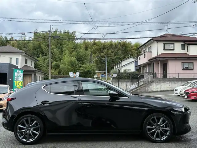 マツダ マツダ３ファストバック XD Lパッケージ 熊本県 2019(令1)年 8万km ジェットブラックマイカ BOSEサウンド/純正ナビ/【CD/DVD/SD/BT/HDMI】/全方位カメラ/i-ACTIVSENSE/スマートブレーキサポート/車線逸脱警報/ブラインドスポットモニター/コーナーセンサー/黒革シート/シートヒーター/パワーシート/ステアリングヒーター/ステアリングリモコン/純正18インチAW/ビルトインETC/オートLEDヘッドライト/電子パーキング/スマートキー/プッシュスタート