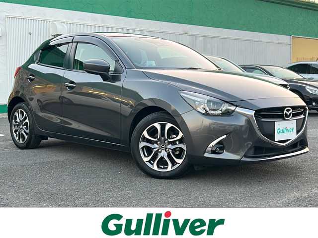 マツダ デミオ XD ツーリング Lパッケージ 徳島県 2017(平29)年 7.4万km マシーングレープレミアムM ターボ/純正SDナビ/（Bluetooth/ワンセグ/CD/DVD/AUX）/バックカメラ/シートヒーター（D+N席）/クルーズコントロール/パドルシフト/LEDヘッドライト/オートライト/ビルトインETC/純正AW/純正フロアマット/プッシュスタート/スマートキー/スペアキー