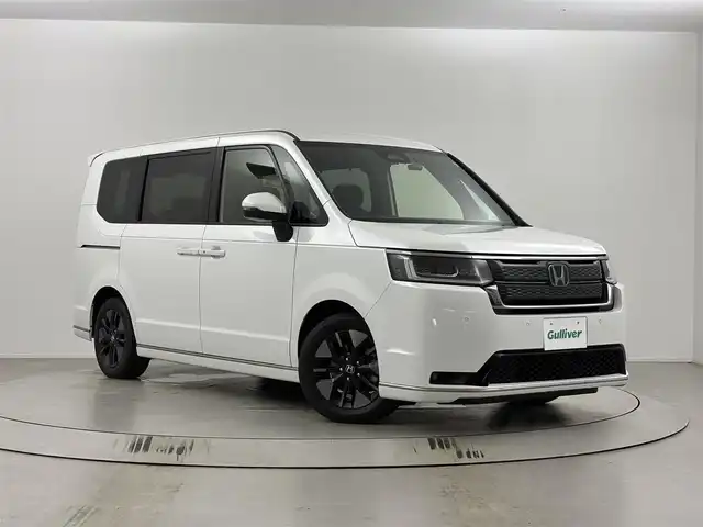 ホンダ ステップワゴン スパーダ eHEV 埼玉県 2023(令5)年 2万km プラチナホワイトパール 純正ナビ/（BT/CD／DVD／AM／FM／フルTV）/バックカメラ/ホンダセンシング/・衝突軽減ブレーキ/・アダプティブクルーズコントロール/・車線維持支援システム/・誤発進抑制機能/・後方誤発進抑制機能/BSM/純正アルミホイール/両側パワースライドドア/パワーバックドア/ハーフレザーシート/シートヒーター/純正ドラレコ/パドルシフト