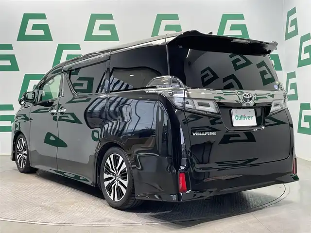 トヨタ ヴェルファイア Z Gエディション 鹿児島県 2019(平31)年 4.6万km バーニングブラッククリスタルシャインガラスフレーク 純正ナビ/(フルセグTV/Bluetooth/DVD/CD)/バックカメラ/両側パワースライドドア/クルーズコントロール/前席シートヒーター/シートベンチレーション/1/2列目パワーシート/オットマン/運転席シートメモリ/Toyota Safety Sense/　・プリクラッシュセーフティ/　・レーダークルーズコントロール/　・レーントレーシングアシスト/　・ロードサインアシスト/　・アダプティブハイビームシステム/　・インテリジェントクリアランスソナー/ドライブレコーダー/ETC/ステアリングヒーター/電動パーキングブレーキ/オートブレーキホールド/ロールサンシェード/純正アルミホイール/純正フロアマット/電動格納ミラー