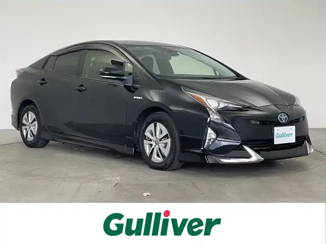 トヨタ プリウス Sセーフティプラス 大分県 2018(平30)年 5.9万km アティチュードブラックマイカ 社外SDナビ/（フルセグ/CD/DVD/Bluetooth）/プリクラッシュセーフティー/LTA（操舵支援有り）/オートハイビーム/ビルトインETC/レーダークルーズコントロール/バックカメラ/オートリトラミラー/ステアリングスイッチ/保証書・取扱説明書/スマートキープッシュスタート