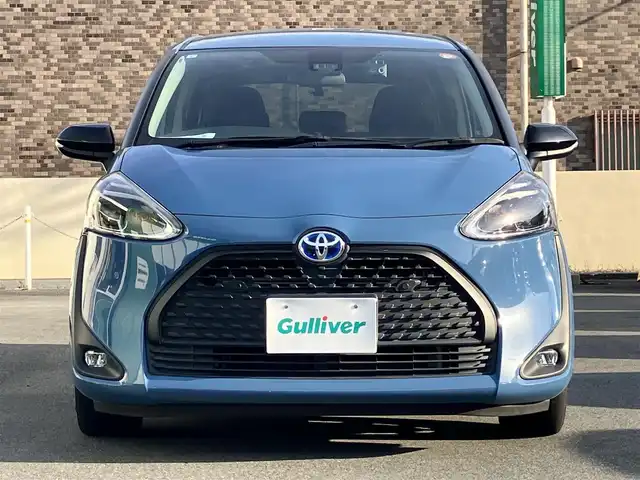 トヨタ シエンタ ハイブリッド G セーフティエディションⅡ 静岡県 2021(令3)年 5.4万km グレイッシュブルー エンジンスタートボタン/パワーステアリング/パワーウィンドウ/アイドリングストップ/オートエアコン/スマートキー/スペアキー1本/クルーズコントロール/USB入力端子/ETC/バックカメラ/純正ナビ（CD/DVD/BT/フルセグ）/ドライブレコーダー前後/ウォークスルー/純正フロアマット/布シート/両側パワースライドドア/社外アルミホイール/ABS/横滑り防止装置/コーナーセンサー前後/レーンキープアシスト/オートライト/オートマチックハイビーム/LEDヘッドライト/Wエアバッグ/衝突軽減システム/タンブルシート