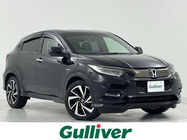 ホンダ ヴェゼル ハイブリッド RS ホンダセンシング 大阪府 2018(平30)年 5万km クリスタルブラックパール ホンダセンシング/　・衝突軽減ブレーキ/　・誤発進抑制機能/　・アダプティブクルーズコントロール/　・車線維持支援システム/社外メモリナビ/　　CD/DVD/BT/フルセグTV/バックカメラ/LEDオートライト/フォグランプ/合皮ハーフレザーシート/シートヒーター/純正18インチアルミホイール/パドルシフト/アイドリングストップ/スマートキー/ビルトインETC