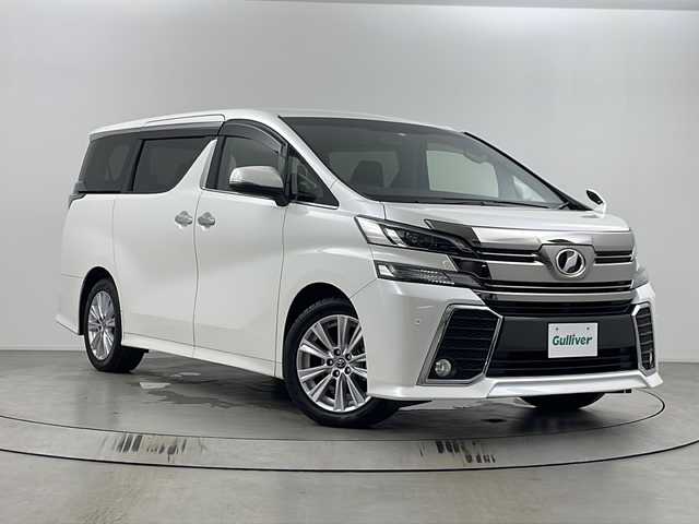 トヨタ ヴェルファイア Z Aエディション 埼玉県 2016(平28)年 2.1万km ホワイトパールクリスタルシャイン 純正9インチナビ　/　AM/FM/CD/DVD/BT/フルセグTV/バックカメラ　/クルーズコントロール　/ビルトインＥＴＣ　/両側パワースライドドア　/前後コーナーセンサー　/オットマン　/ブレードホールド　/純正１８インチアルミホイール　/フォグランプ　/純正フロアマット/ドアバイザー