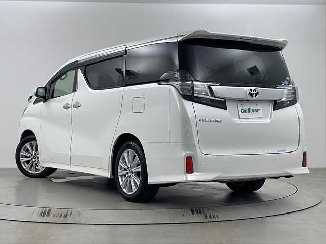 トヨタ ヴェルファイア Z Aエディション 埼玉県 2016(平28)年 2.1万km ホワイトパールクリスタルシャイン 純正9インチナビ　/　AM/FM/CD/DVD/BT/フルセグTV/バックカメラ　/クルーズコントロール　/ビルトインＥＴＣ　/両側パワースライドドア　/前後コーナーセンサー　/オットマン　/ブレードホールド　/純正１８インチアルミホイール　/フォグランプ　/純正フロアマット/ドアバイザー