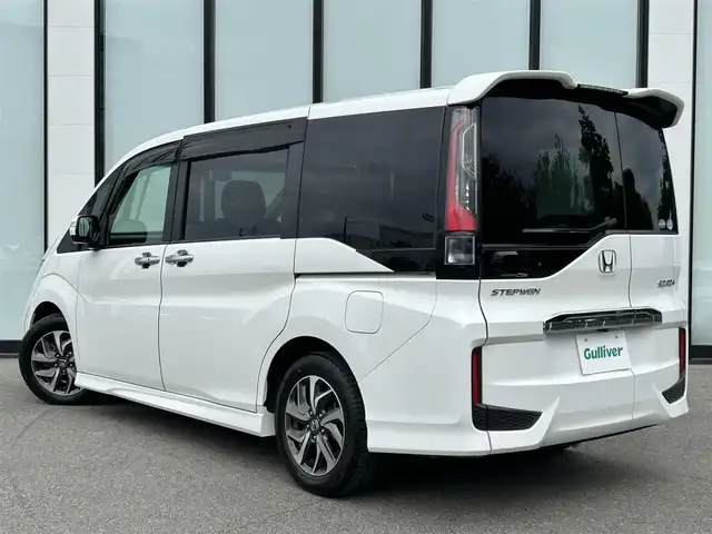 ホンダ ステップワゴン スパーダ ホンダセンシング 大阪府 2017(平29)年 4.9万km ホワイトオーキッドパール 純正ナビ　/   フルセグＴＶ/CD/DVD/Bluetooth　/バックモニター　/ホンダセンシング　/９インチ後席モニター　/両側パワースライドドア　/アイドリングストップ/パドルシフト/純正16インチアルミホイール/純正フロアマット（1列目）/Clazzioマット（2列目）　/プッシュスタート/スマートキー　/ビルトインＥＴＣ　/ＬＥＤ