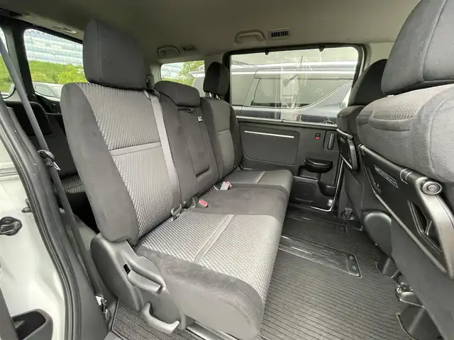 ホンダ ステップワゴン スパーダ ホンダセンシング 大阪府 2017(平29)年 4.9万km ホワイトオーキッドパール 純正ナビ　/   フルセグＴＶ/CD/DVD/Bluetooth　/バックモニター　/ホンダセンシング　/９インチ後席モニター　/両側パワースライドドア　/アイドリングストップ/パドルシフト/純正16インチアルミホイール/純正フロアマット（1列目）/Clazzioマット（2列目）　/プッシュスタート/スマートキー　/ビルトインＥＴＣ　/ＬＥＤ