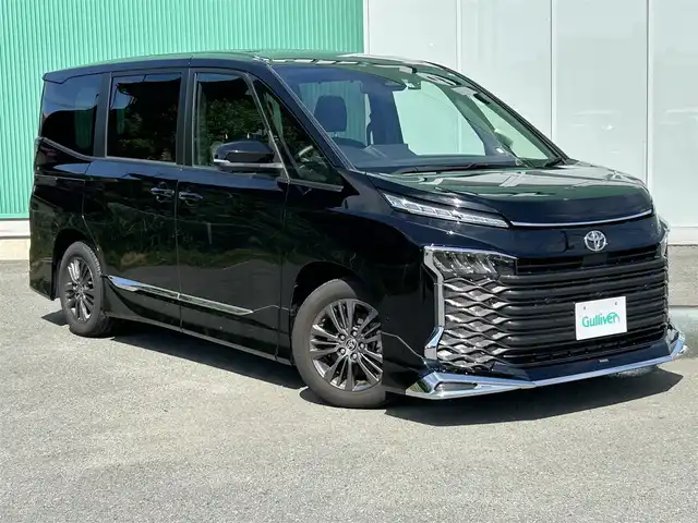 トヨタ ヴォクシー S－G 福岡県 2022(令4)年 1.4万km アティチュードブラックマイカ プッシュスタートボタン/スマートキー/クルーズコントロール/純正ナビ/Bluetoothオーディオ/USB接続/全方位カメラ/ETC2.0/前後ドライブレコーダー/純正フロアマット/純正アルミホイール/モデリスタエアロ/LEDヘッドライト/運転席・助手席シートヒーター