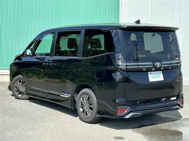 トヨタ ヴォクシー S－G 福岡県 2022(令4)年 1.4万km アティチュードブラックマイカ プッシュスタートボタン/スマートキー/クルーズコントロール/純正ナビ/Bluetoothオーディオ/USB接続/全方位カメラ/ETC2.0/前後ドライブレコーダー/純正フロアマット/純正アルミホイール/モデリスタエアロ/LEDヘッドライト/運転席・助手席シートヒーター