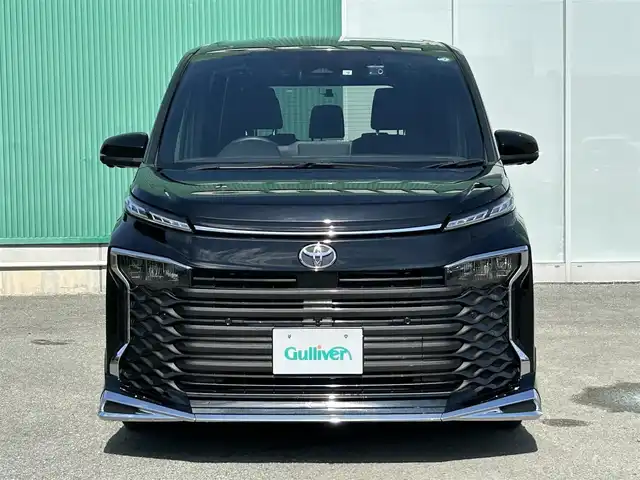 トヨタ ヴォクシー S－G 福岡県 2022(令4)年 1.4万km アティチュードブラックマイカ プッシュスタートボタン/スマートキー/クルーズコントロール/純正ナビ/Bluetoothオーディオ/USB接続/全方位カメラ/ETC2.0/前後ドライブレコーダー/純正フロアマット/純正アルミホイール/モデリスタエアロ/LEDヘッドライト/運転席・助手席シートヒーター