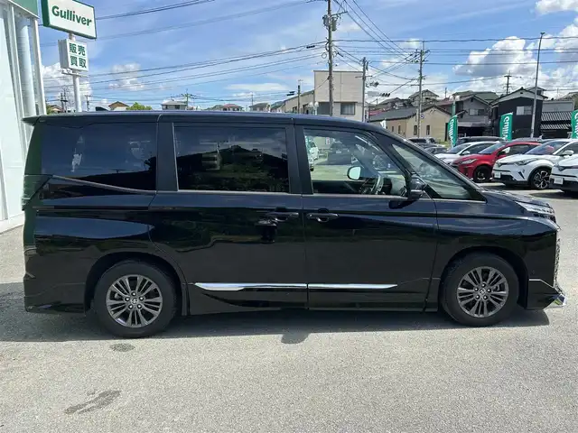トヨタ ヴォクシー S－G 福岡県 2022(令4)年 1.4万km アティチュードブラックマイカ プッシュスタートボタン/スマートキー/クルーズコントロール/純正ナビ/Bluetoothオーディオ/USB接続/全方位カメラ/ETC2.0/前後ドライブレコーダー/純正フロアマット/純正アルミホイール/モデリスタエアロ/LEDヘッドライト/運転席・助手席シートヒーター