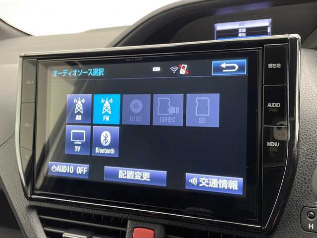 トヨタ ヴォクシー ZS G’s 宮崎県 2016(平28)年 6.1万km ホワイトパールクリスタルシャイン 禁煙車/トヨタセーフティセンス/純正10型ナビTV/（NSZT-ZA4T/CD/DVD/Bluetooth/フルセグTV）/純正バックカメラ/純正ビルトインETC/純正LEDオートライト/純正LEDビーム/純正エアロ/純正ルーフエンドスポイラー/純正18インチアルミ/純正フロアマット/両側電動スライドドア/レーンディパーチャーアラート/オートマチックハイビーム/プリクラッシュセーフティ/デュアルオートエアコン/ハーフレザーシート/ウインカードアミラー/本革巻ハンドル/スマートキー/プリクラッシュセーフティ/新車時保証書/取扱い説明書