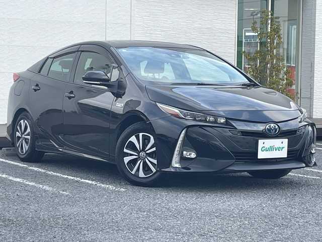 トヨタ プリウス ＰＨＶ S ナビパッケージ 千葉県 2020(令2)年 5.7万km アティチュードブラックマイカ 1オーナーー ソーラーパネルルーフ 11.6型ナビ 全方位カメラ PCS LTA AHB BSM RSA パーキングサポート ふらつき検知 AC100V 2.0ETC ドラレコ クルコン LEDライト/ソーラー充電システム/純正ビルトインETC2.0/プッシュスタート/純正LED/先行車発進告知機能 （TMN）/レーダークルーズコントロール（全車速追従機能付）/オートマチックハイビーム（AHB）/ロードサインアシスト（RSA）/パーキングサポートブレーキ（前後方静止物）/ブラインドスポットモニター（BSM）/リヤクロストラフィックアラート（RCTA）/S-VSC（ステアリング協調車両安定性制御システム）/TRC（トラクションコントロール）/SRSエアバッグ/ハンズフリー/T-Connect