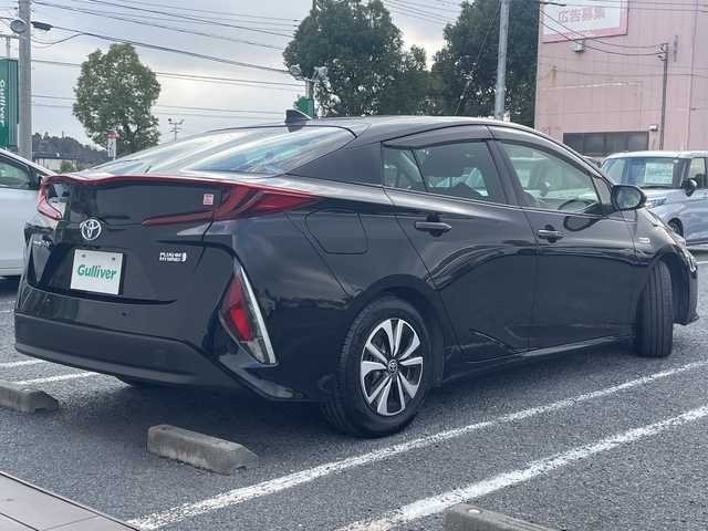 トヨタ プリウス ＰＨＶ S ナビパッケージ 千葉県 2020(令2)年 5.7万km アティチュードブラックマイカ 1オーナーー ソーラーパネルルーフ 11.6型ナビ 全方位カメラ PCS LTA AHB BSM RSA パーキングサポート ふらつき検知 AC100V 2.0ETC ドラレコ クルコン LEDライト/ソーラー充電システム/純正ビルトインETC2.0/プッシュスタート/純正LED/先行車発進告知機能 （TMN）/レーダークルーズコントロール（全車速追従機能付）/オートマチックハイビーム（AHB）/ロードサインアシスト（RSA）/パーキングサポートブレーキ（前後方静止物）/ブラインドスポットモニター（BSM）/リヤクロストラフィックアラート（RCTA）/S-VSC（ステアリング協調車両安定性制御システム）/TRC（トラクションコントロール）/SRSエアバッグ/ハンズフリー/T-Connect