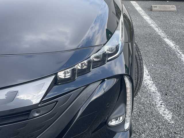 トヨタ プリウス ＰＨＶ S ナビパッケージ 千葉県 2020(令2)年 5.7万km アティチュードブラックマイカ 1オーナーー ソーラーパネルルーフ 11.6型ナビ 全方位カメラ PCS LTA AHB BSM RSA パーキングサポート ふらつき検知 AC100V 2.0ETC ドラレコ クルコン LEDライト/ソーラー充電システム/純正ビルトインETC2.0/プッシュスタート/純正LED/先行車発進告知機能 （TMN）/レーダークルーズコントロール（全車速追従機能付）/オートマチックハイビーム（AHB）/ロードサインアシスト（RSA）/パーキングサポートブレーキ（前後方静止物）/ブラインドスポットモニター（BSM）/リヤクロストラフィックアラート（RCTA）/S-VSC（ステアリング協調車両安定性制御システム）/TRC（トラクションコントロール）/SRSエアバッグ/ハンズフリー/T-Connect