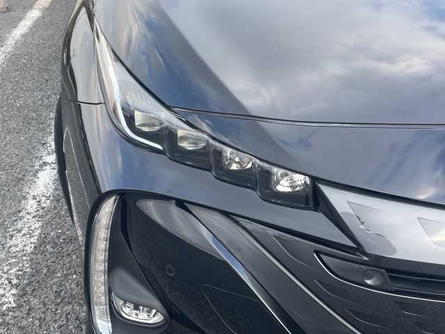 トヨタ プリウス ＰＨＶ S ナビパッケージ 千葉県 2020(令2)年 5.7万km アティチュードブラックマイカ 1オーナーー ソーラーパネルルーフ 11.6型ナビ 全方位カメラ PCS LTA AHB BSM RSA パーキングサポート ふらつき検知 AC100V 2.0ETC ドラレコ クルコン LEDライト/ソーラー充電システム/純正ビルトインETC2.0/プッシュスタート/純正LED/先行車発進告知機能 （TMN）/レーダークルーズコントロール（全車速追従機能付）/オートマチックハイビーム（AHB）/ロードサインアシスト（RSA）/パーキングサポートブレーキ（前後方静止物）/ブラインドスポットモニター（BSM）/リヤクロストラフィックアラート（RCTA）/S-VSC（ステアリング協調車両安定性制御システム）/TRC（トラクションコントロール）/SRSエアバッグ/ハンズフリー/T-Connect