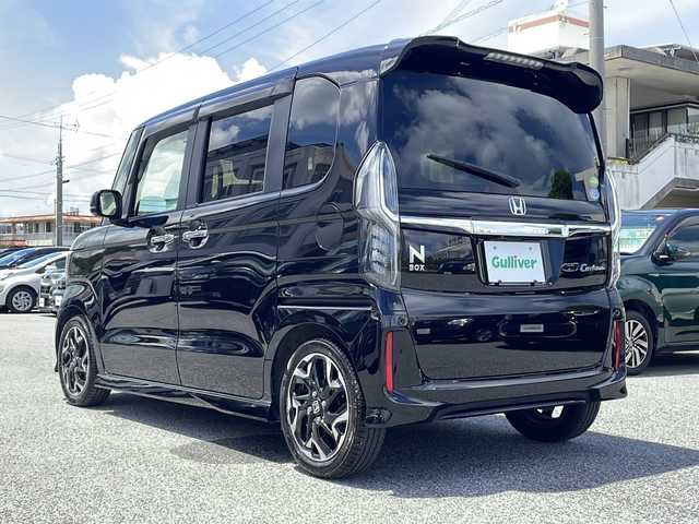ホンダ Ｎ ＢＯＸ カスタム G EX ターボ ホンダセンシング 沖縄県 2018(平30)年 5.2万km クリスタルブラックパール ワンオーナー/純正8インチメモリーナビ/CD/DVD/HDMI/Bluetooth/フルセグTV/バックカメラ/両側パワースライドドア/ホンダセンシング/アダプティブクルーズコントロール/衝突被害軽減ブレーキ/車線維持支援システム/オートマチックハイビーム/LEDオートヘッドライト/パドルシフト/ハーフレザーシート/ドライブレコーダー/ETC/禁煙車