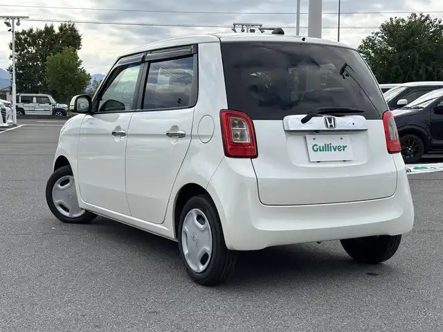 ホンダ Ｎ ＯＮＥ G Aパッケージ 奈良県 2014(平26)年 6万km プレミアムホワイトパール 純正７インチナビ（VXM-152VFi)/（フルセグ／ＢＴ／ＣＤ／ＤＶＤ）/バックカメラ/横滑り防止/オートライト/電動格納ミラー/プッシュスタート/ETC/ステアリングスイッチ/純正ホイールキャップ/取り扱い説明書