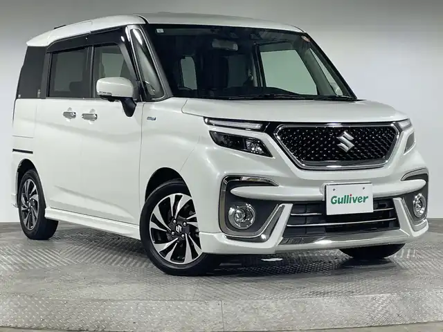 スズキ ソリオ バンディット HV MV 神奈川県 2021(令3)年 2.3万km ピュアホワイトP スズキセーフティサポート/・デュアルセンサーブレーキサポート/・誤発進抑制機能/・車線逸脱警報機能/・先行車発進お知らせ機能/・標識認識機能/・ハイビームアシスト/純正10型ナビ/・BT/フルセグTV/SD/USB/CD/DVD/全方位モニター/シートヒーター(D/N)/アイドリングストップ機能/両側電動ドア/コーナーセンサー/革巻きステアリング/ステアリングスイッチ/Autoライト/アダプティブクルーズコントロール/スマートキー/スペアキー/プッシュスタートボタン/LEDライト/フォグランプ/シートリフター/電動格納ミラー/ウィンカーミラー/純正フロアマット/純正15インチアルミホイール/純正ドアバイザー