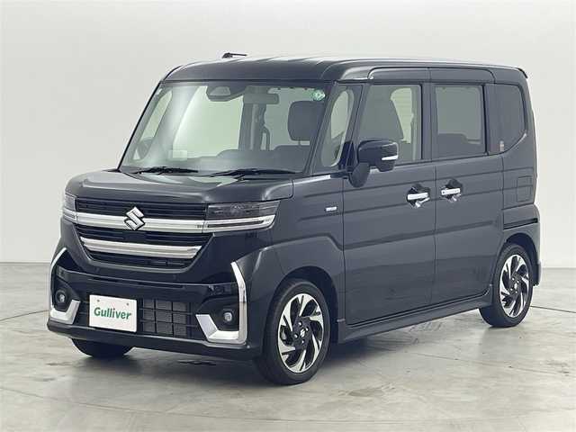 スズキ スペーシア カスタム HYBRID XS 福岡県 2024(令6)年 0.1万km未満 ブルーイッシュブラックパール3 登録届出済未使用車　/社外８型ナビ　/フルセグTV/バックカメラ　/アダプティブクルーズコントロール　/コーナーセンサー　/デュアルセンサーブレーキサポート　/標識認識　/先行車発進お知らせ　/両側電動スライドドア　/ハーフレザーシート　/シートヒーター　/ステアリングリモコン　/ステアリングヒーター　/ＨＵＤ　/純正１５インチアルミホイール　/LEDヘッドライト