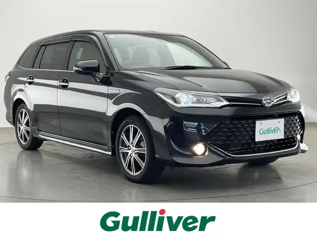 トヨタ カローラ フィールダー ハイブリッドG ダブルバイビー 愛知県 2016(平28)年 6.7万km ブラックマイカ 純正ＳＤナビ　フルセグＴＶ　Ｂｌｕｅｔｏｏｔｈ　バックカメラ　プッシュスタート　スマートキー　ＥＴＣ　ハーフレザー　セーフティセンス　衝突軽減　車線逸脱　ＬＥＤオートライト　フォグランプ　ナノイーエアコン　純正フロアマット　禁煙車