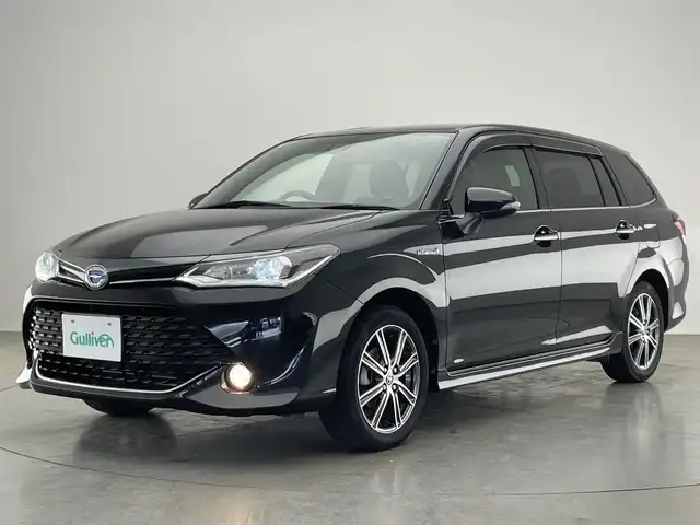 トヨタ カローラ フィールダー ハイブリッドG ダブルバイビー 愛知県 2016(平28)年 6.7万km ブラックマイカ 純正ＳＤナビ　フルセグＴＶ　Ｂｌｕｅｔｏｏｔｈ　バックカメラ　プッシュスタート　スマートキー　ＥＴＣ　ハーフレザー　セーフティセンス　衝突軽減　車線逸脱　ＬＥＤオートライト　フォグランプ　ナノイーエアコン　純正フロアマット　禁煙車