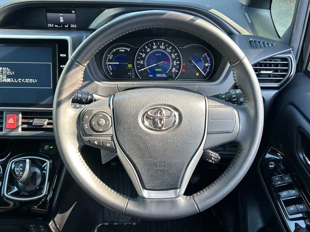 トヨタ ノア ハイブリッド Si ダブルバイビー 大阪府 2018(平30)年 5.9万km ブラック 純正10インチナビ（フルセグ/BT/DVD/CD)/純正後席モニター/両側パワースライドドア/衝突被害軽減システム/横滑り防止装置/レーンキープアシスト/オートマチックハイビーム/クルーズコントロール/アイドリングストップ/シートヒーター/ハーフレザー/純正AW(16inch)/純正LEDライト/純正フロアマット/ビルトインETC/ドライブレコーダー/スペアキー1本