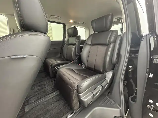 日産 エルグランド 250ハイウェイスターS 岡山県 2018(平30)年 6.8万km ファントムブラック 純正8インチナビ(MM516D-L)/(フルセグTV/CD/DVD/Blu-ray/Bluetooth/AUX)/両側パワースライドドア/ハーフレザー/ビルトインETC/LEDヘッドライト/バックカメラ/クルーズコントロール/社外ドライブレコーダー/プッシュスタート/スマートキー/アイドリングストップ/レーンキープアシスト/純正フロアマット/純正18インチアルミホイール/オートライト/フォグランプ
