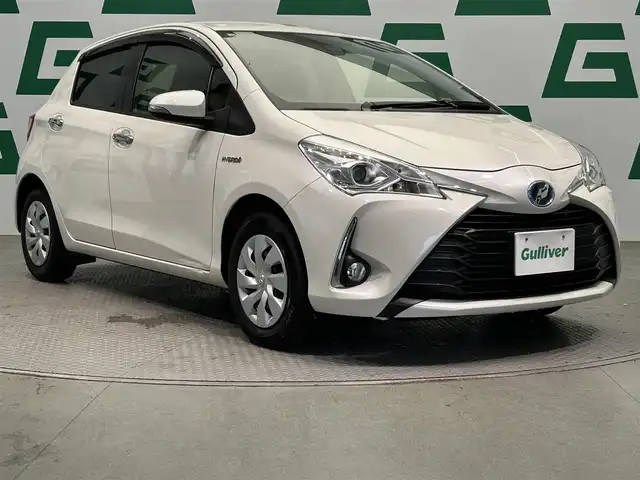 トヨタ ヴィッツ ハイブリッド F セーフティエディション 鹿児島県 2018(平30)年 6.5万km ホワイトパールクリスタルシャイン 純正ナビ（NSCN-W68）/バックカメラ/ワンセグTV/ビルトインETC/トヨタセーフティセンスC/オートマチックハイビーム/PCS/LDA/先行車発進お知らせ機能/電格ミラー/フロントフォグ/純正フロアマット/純正ドアバイザー/ステアリングリモコン/禁煙車