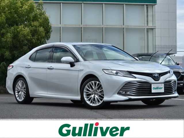 トヨタ カムリ G レザーパッケージ 鹿児島県 2018(平30)年 7.1万km プラチナホワイトパールマイカ アダプティブクルーズコントロール　/ビルトインＥＴＣ２．０　/Ｄ＋Ｎ席シートヒーター　/Ｄ＋Ｎ席パワーシート　/純正ＳＤナビ　/Ｂｌｕｅｔｏｏｔｈオーディオ　/ＭＴモード付きＡＴ　/ヘッドアップディスプレイ/テレビキャンセラー/フルレザーシート/トヨタセーフティセンス/インテリジェントクリアランスソナー/横滑り防止装置/レーンキープアシスト/エアバッグ(W+サイド)/カーテンエアバッグ/プッシュスタート/スマートキー/アイドリングストップ/純正アルミホイール(18インチ)