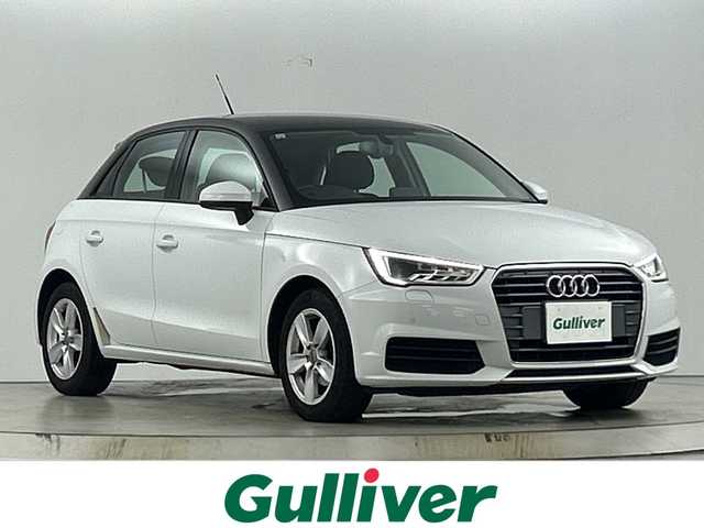 アウディ Ａ１ SB 1．0TFSI 愛知県 2017(平29)年 5.2万km グレイシアホワイトメタリック 純正ナビ/（AM/FM/フルセグ/BlueTtooth/CD/DVD）/バックカメラ/D/N席シートヒーター/パーキングエイド/MTモード付AT/アイドリングストップ/純正15インチアルミホイール/バイキセノンヘッドライト/ETC/横滑り防止機能/オートライト/電動格納ミラー/ステアリングスイッチ/純正フロアマット/スマートキー/プッシュスタート/スペアキー