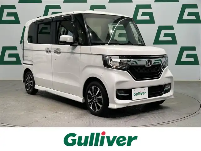 ホンダ Ｎ ＢＯＸ カスタム G L ホンダセンシング 鹿児島県 2020(令2)年 1.7万km プラチナホワイトパール 社外ナビ　/ワンセグＴＶ　/Ｂｌｕｅｔｏｏｔｈ　/ドラレコ　/クルーズコントロール　/前後ドラレコ　/片側パワスラ　/ビルドインＥＴＣ　/バックカメラ　/前席シートヒーター　/オートマチックハイビーム　/ホンダセンシング/フロアマット/ロール式サンシェード/LEDヘッドライト