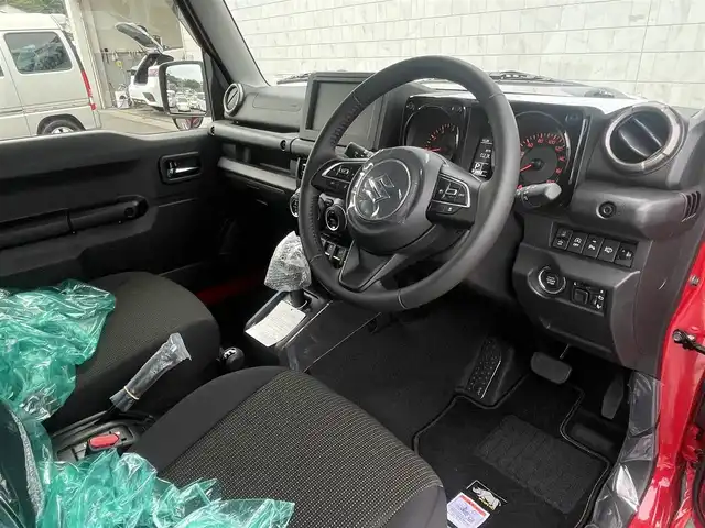 スズキ ジムニー ノマド FC 宮崎県 2025(令7)年 0.1千km 赤 ワンオーナー/４WD/衝突軽減ブレーキ/レーンキープアシスト/レーダークルーズコントロール/LEDヘッドライト/フォグランプ/シートヒーター/スマートキー/プッシュスタート/アイドリングストップ/背面タイヤ