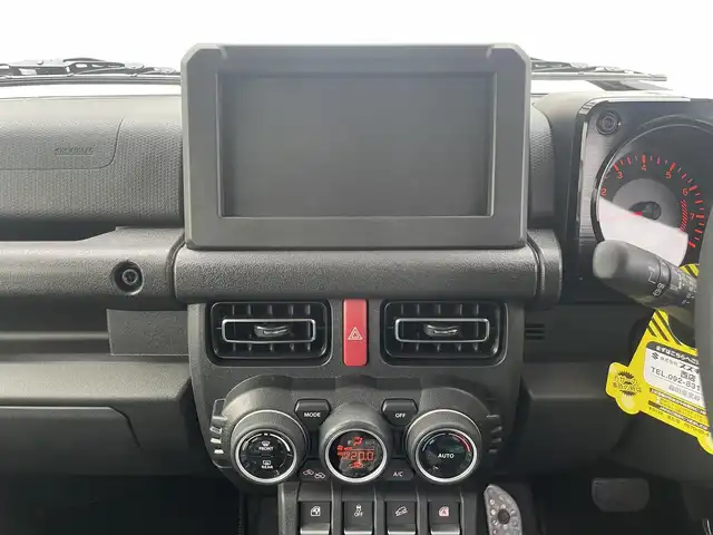 スズキ ジムニー ノマド FC 宮崎県 2025(令7)年 0.1千km 赤 ワンオーナー/４WD/衝突軽減ブレーキ/レーンキープアシスト/レーダークルーズコントロール/LEDヘッドライト/フォグランプ/シートヒーター/スマートキー/プッシュスタート/アイドリングストップ/背面タイヤ
