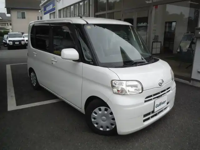 ダイハツ タント ウェルカムシート 東京都 2010(平22)年 5.7万km パール 助手席電動リフトアップシート/保証書・取説あり/電動格納ミラー/キーレス/スペアキー/TEIN車高調/　（純正足廻り車内）