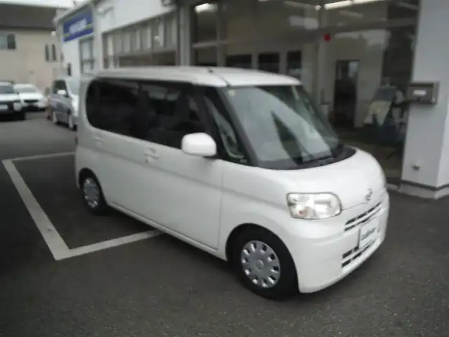 ダイハツ タント ウェルカムシート 東京都 2010(平22)年 5.7万km パール 助手席電動リフトアップシート/保証書・取説あり/電動格納ミラー/キーレス/スペアキー/TEIN車高調/　（純正足廻り車内）